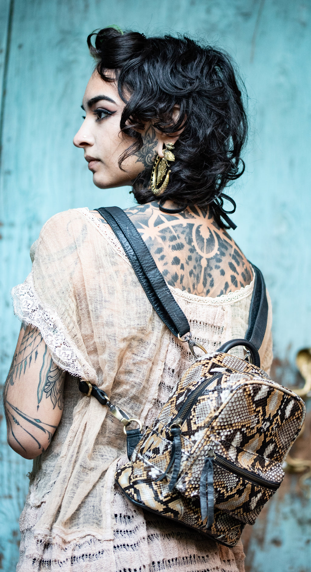 Snakeskin mini backpack top